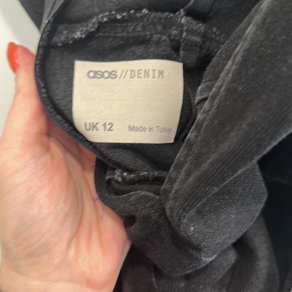 Black Denim low cut, sleeveless jumpsuit with western inspired belt - Picture 5 of 5